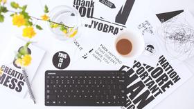 Medium computer keyboard and paper designs in office